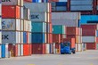 Ciężarówka z kontenerem. Spedycja międzynarodowa. Port morski Gdynia. Polska