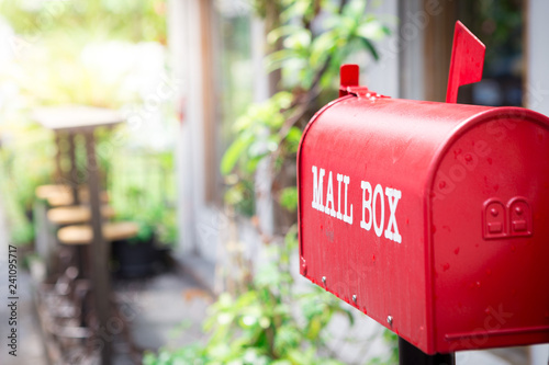 Fotografía Red mailbox in front of the house