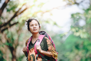 Traveler backpacker asian woman with nature background , concept travel , copy space