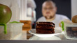 © motortion - Oversize man taking piece of cake from fridge at night, diabetes risk, calories