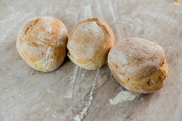 Italian bread on white marble background. Fresh homemade bread bakery