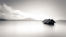 Minimalism Black And White Image Of Abandoned Isolated Lost House Building Flooded With Water