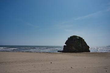 Little island with a sand beach