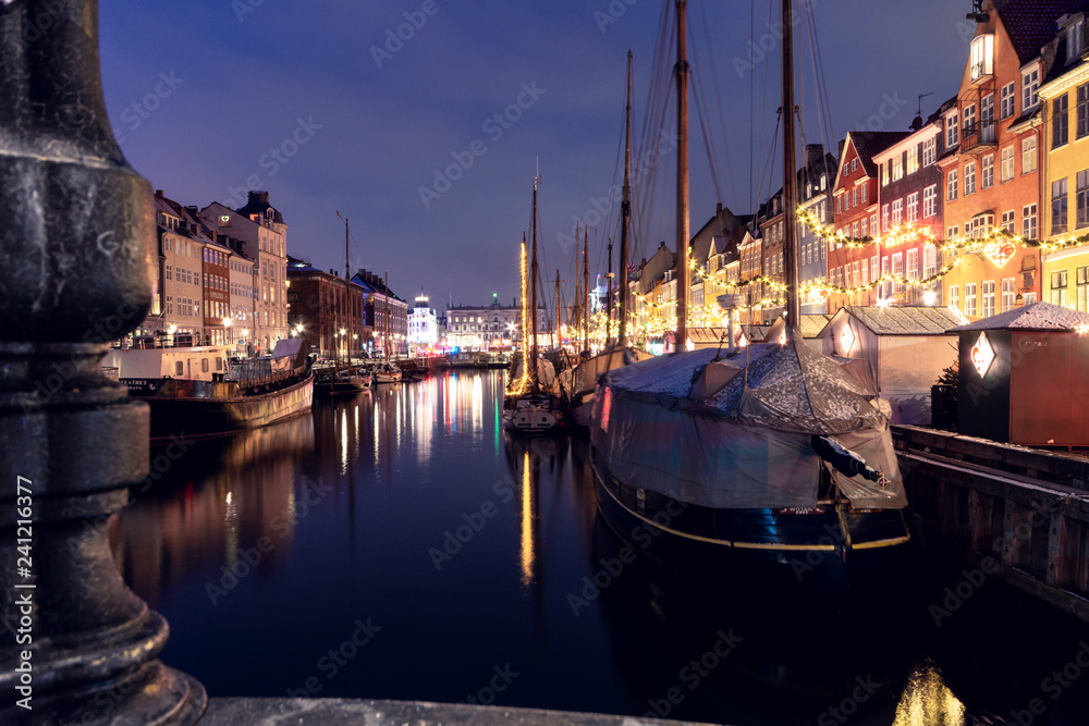 Photo & Art Print Nyhavn christmas market during night with ...