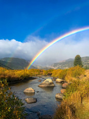 rainbow over lake