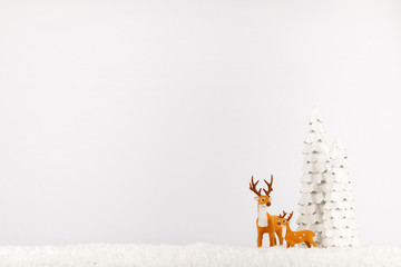 Classic Christmas Reindeer Cartoon Decoration on a Snowy Shelf