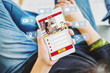 © weedezign - Top view of woman view of beauty blogger review online with mobile apps at home,online influencer technology in daily lifestyle,Digital age concept.