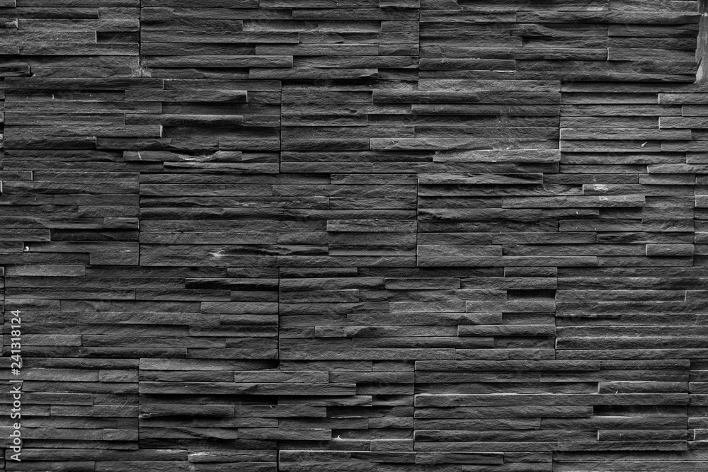 black brick wall of dark stone texture and background Stock Photo ...