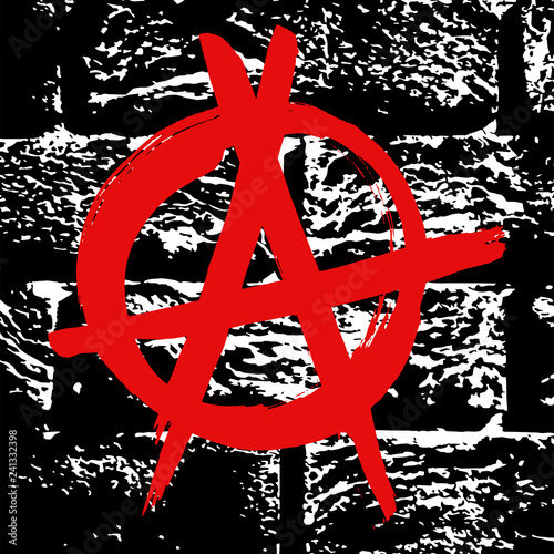 Fotografie, Obraz Black and white grunge brick wall texture with red ink hand drawn symbol of anarchy