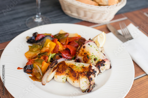 Fotografie, Obraz Delicious grilled calamari squid with vegetable on plate