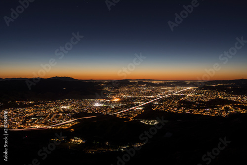 Dusk hilltop view of suburb...