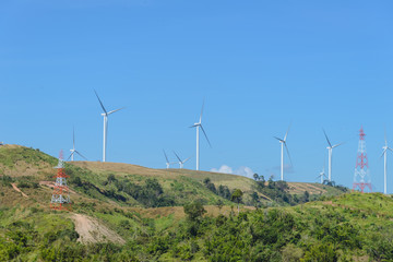 wind turbine on mountain making eclectic energy from wind