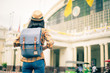 asian woman tourist traveller backpack to train station. at Hua Lamphong Station Bangkok Thailand.