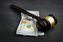 Gavel And Money In The Court. Penalty Or Bribe.