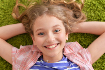 Close up portrait of funny smiling little girl