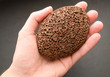 Pumice stone for spa in a hand.