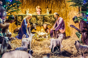 Wooden statue of Christmas, figures of the Virgin Mary and Jesus in the manger.