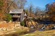 Historic Sixes Mill from the 1800s in Canton, Georgia, during autumn.