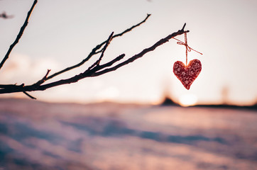 Hearts in warm winter snow - Valentine, romantic date or marriage concept photo with copy space