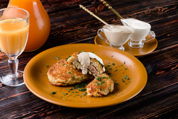 Canvas Print - Draniki - potato fritters. potato pancakes. The naitonal dish of Belarus, Ukraine and Russia