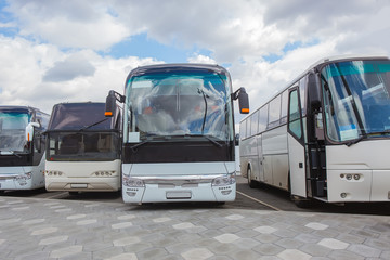 Canvas Print - tourist buses on parking