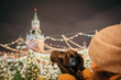 Red Square, Moscow, Russia - December 29, 2018: A photographer is shooting a new 30.1 megapixel full-frame mirrorless interchangeable-lens camera Canon EOS R