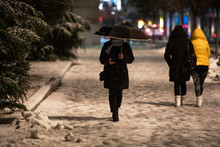 People On The Street In A Snowy Day In Bucharest, Romania.