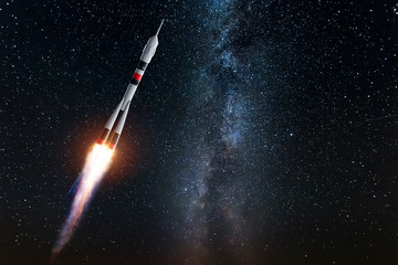 Wall Mural - rocket against the starry sky. the concept of space exploration, satellite launch, flight to the moo