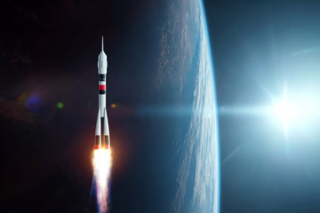 Wall Mural - the rocket flies in space against the backdrop of the earth. the concept of space exploration, satel