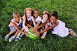 © Evgeniy Kalinovskiy - a group of preschool children in the Park on the grass holding a huge watermelon