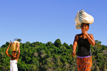 Malagasy woman carrying cargo on head