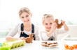 Girls with Easter ginger cookies in different shapes
