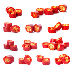 Set with cut fresh red chili peppers on white background