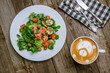 coffee cappuccino with bear pattern and salmon salad top view