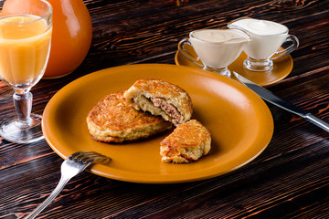 Wall Mural - Draniki - potato fritters. potato pancakes. The naitonal dish of Belarus, Ukraine and Russia