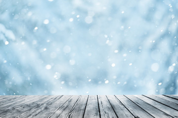 Wall Mural - wooden table and winter forest landscape