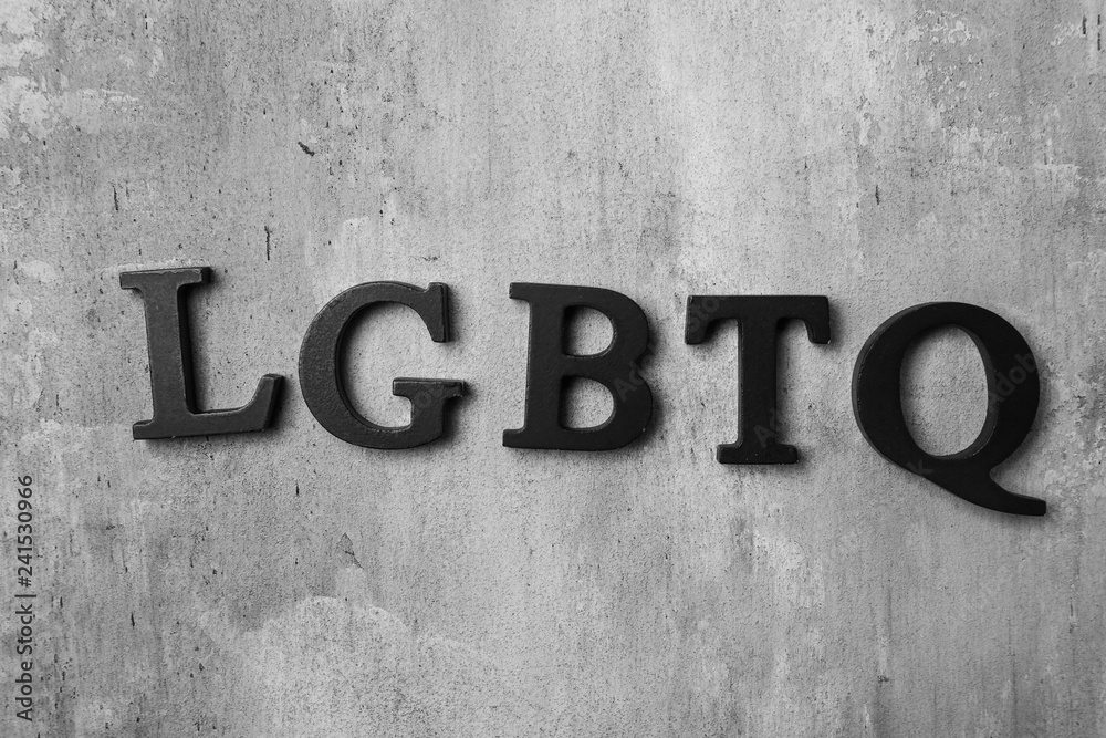 Abbreviation LGBTQ on grey background