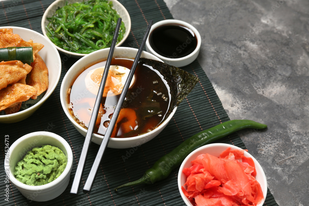 Assortment of Chinese food on grey table