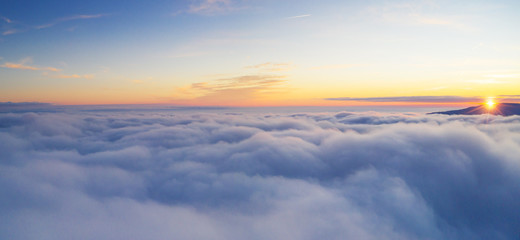 Wall Mural - beautiful sunrise cloudy sky from aerial view