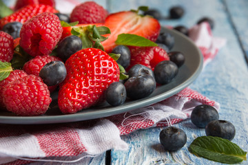 Fresh fruit salad on wooden table