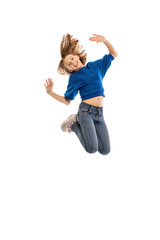 Cute teen girl in a jump, isolated on white background