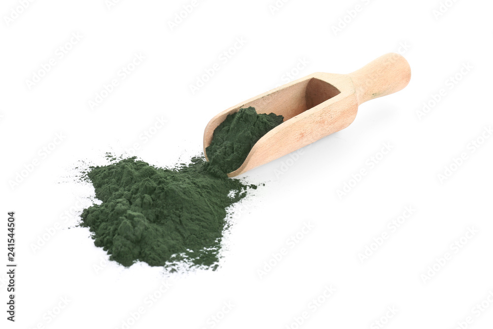 Scoop with spirulina powder on white background