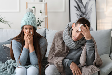 Couple ill with flu at home