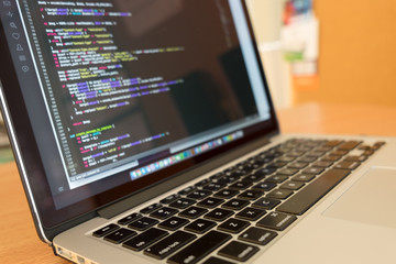 developer notebook and keyboard coding java script