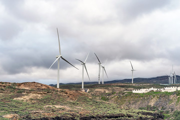 Landscape with turbine green energy generating electricity , windmills for electric power production.