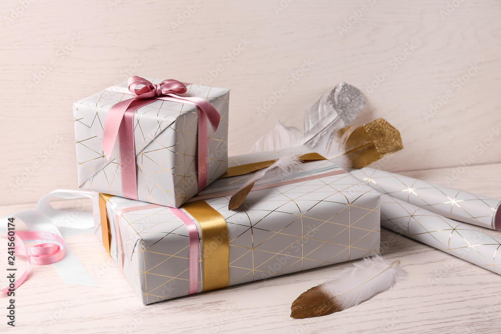 Festive gift boxes on table