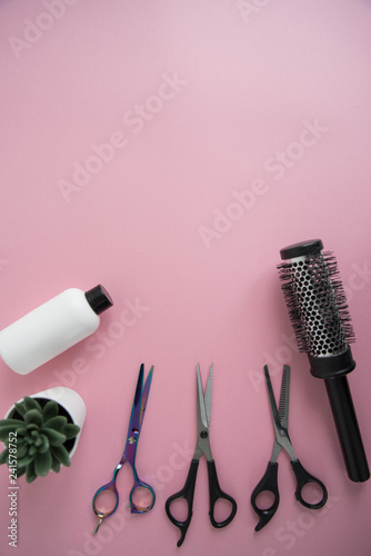 Professional Hair Dresser Tools On Pink Background With Copy Space