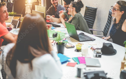 Cuadros en Lienzo Young co-workers team talking during startup - Happy people planning a new proje