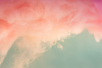 abstract pastel pink color paint with pastel blue background.. fluid composition with copy space. mi
