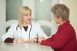 © Alexandr - stylish aged woman at the reception at the doctor in the clinic